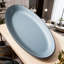 Plateau ovale bleu en cuir fabriqué à la main pour les bijoux et les montres, organisateur de bureau imperméable et résistant aux taches, plateau décoratif élégant pour table de maquillage et décoration intérieure