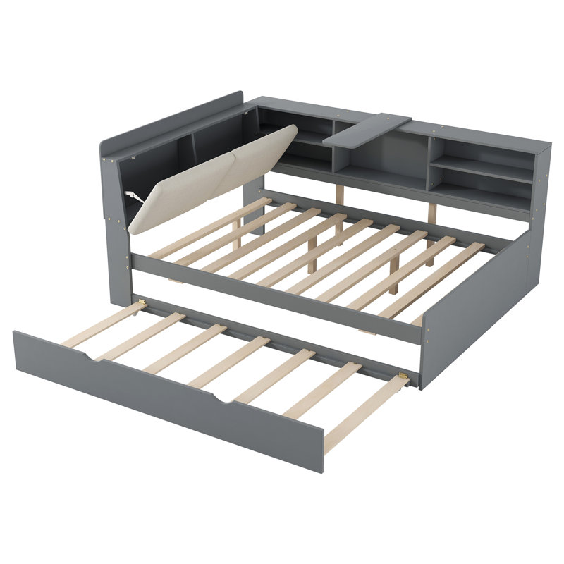Lit plateforme fonctionnel en bois avec lit gigogne, grandes tablettes de rangement et tête de lit confortable pour une utilisation optimale dans la chambre à coucher