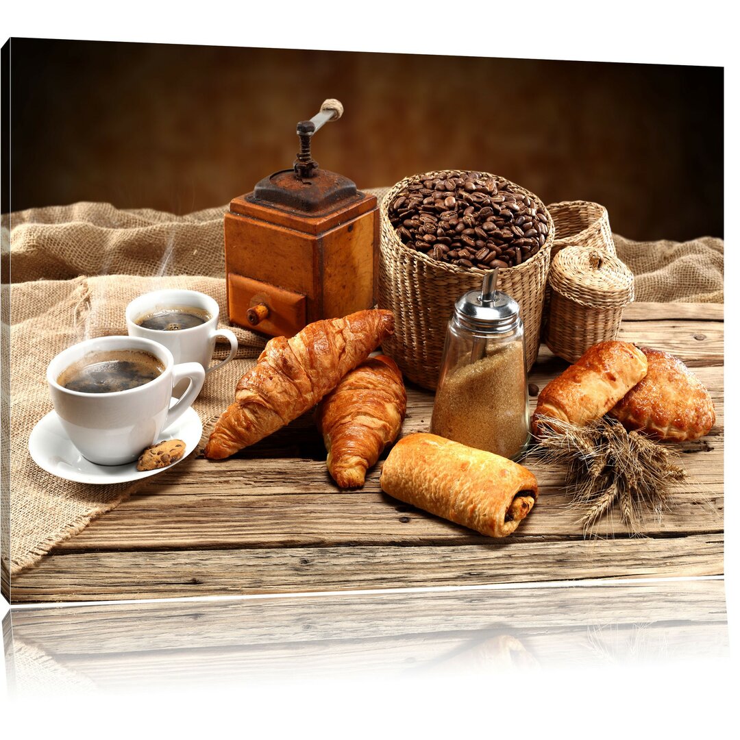 Leinwandbild Aromatischer Kaffee mit Croissants