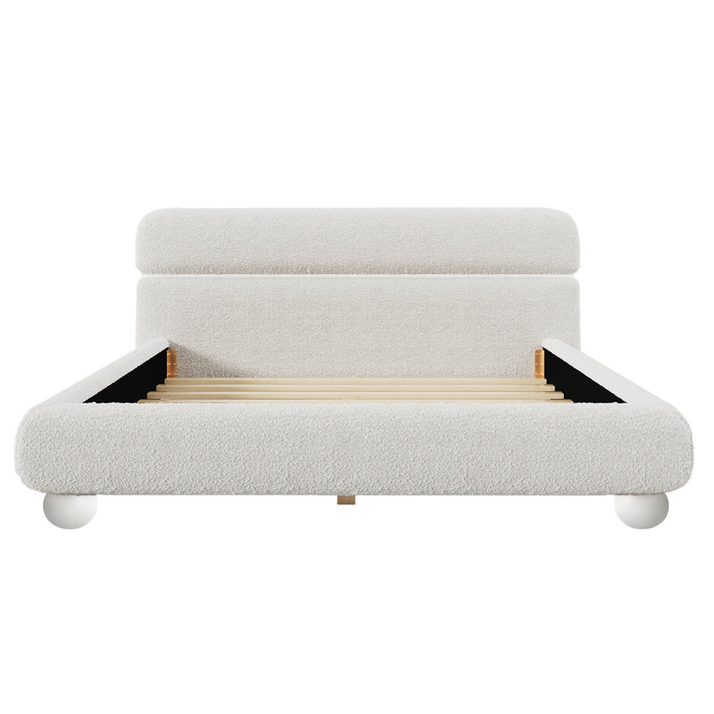 Lit tapissier contemporain avec tissu bouclé en molleton et pieds ronds massifs, design courbé élégant pour la chambre à coucher