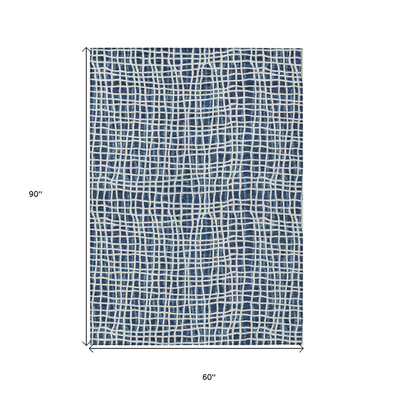 Tapis extérieur lavable rayé bleu marine et ivoire 5 pi x 8 pi