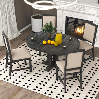 Ensemble de salle à manger 5 pièces avec table ronde extensible et 4 chaises rembourrées pour la cuisine et la salle à manger (noir)