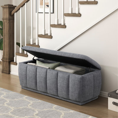 Banc de rangement gris avec contreplaqué et rembourrage en mousse
