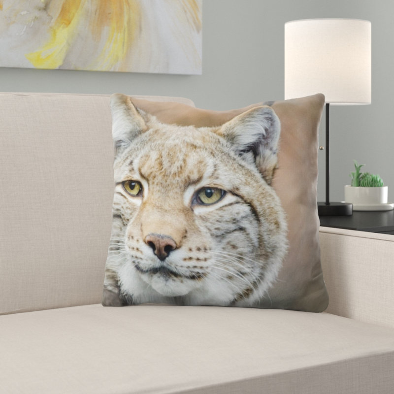 Coussin en jeté lynx