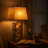 Mell Metal Table Lamp with X Shape Design and Mirror Front,Multicolor