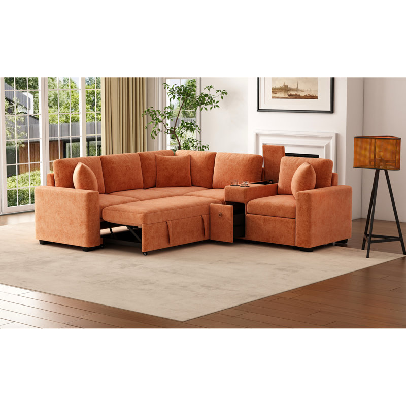 Canapé-lit d'angle modulaire orange de 306 cm (120,5 po) avec lit gigogne, espace de rangement, porte-gobelets et coussins amovibles pour un confort optimal au salon. Solution intelligente et confortable en forme de L.