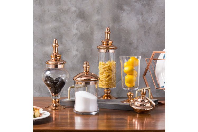collection of glass apothecary jars