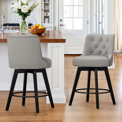 Roland Swivel 26.7'' Upholstered Counter Stool