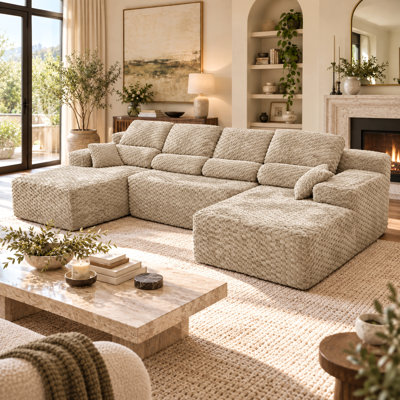 Canapé d'angle en forme de U avec double méridienne, revêtement texturé et coussins décoratifs