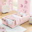 Lit simple tapissier à boucle simple rose, avec une jolie tête d'oreille de lapin, des panneaux et un espace de rangement pour la conception du lit