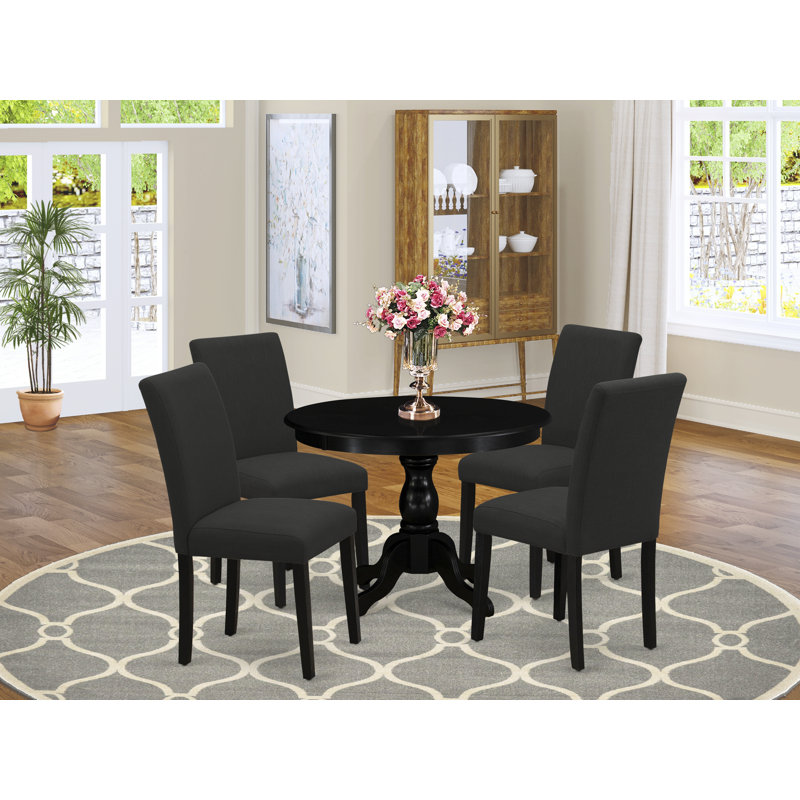 Ensemble de table à manger 5 pièces pour 4 personnes comprenant une table ronde avec piédestal et 4 chaises de salle à manger Parson en tissu noir, noir brossé