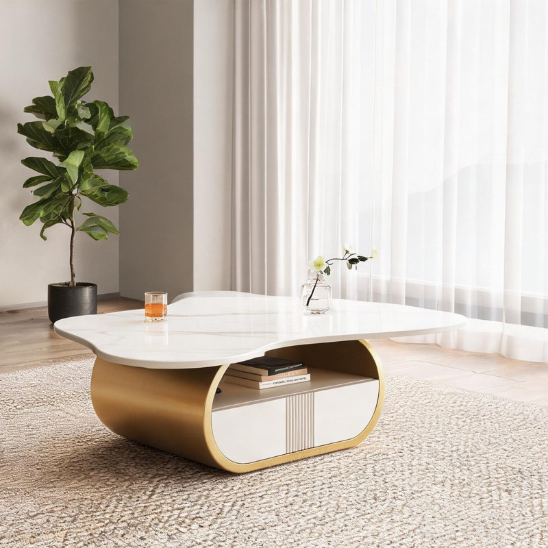 Table basse ovale de couleur blanche pour une pièce maîtresse de salon moderne et chaleureuse avec une élégance sculpturale inspirée des papillons