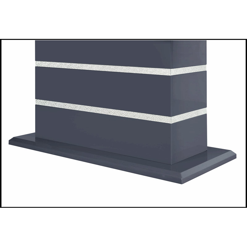 Table de salle à manger sophistiquée gris foncé avec détails scintillants, parfaite pour un décor moderne et élégant