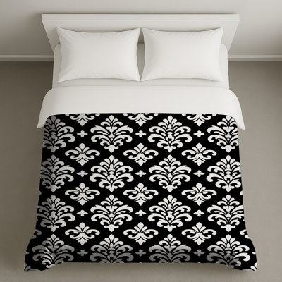 Housses de couette damassées noires et blanches
