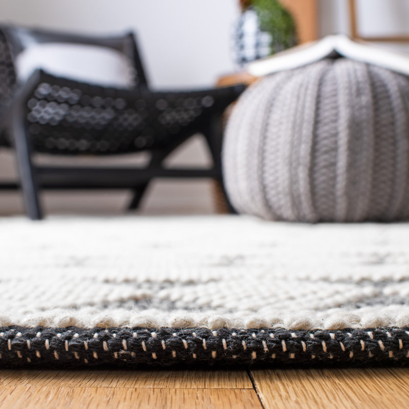 Handmade Black and Ivory Geometric Wool Area Rug