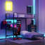Lits superposés simples au-dessus d'un lit simple en métal avec poste de travail moderne pour la maison