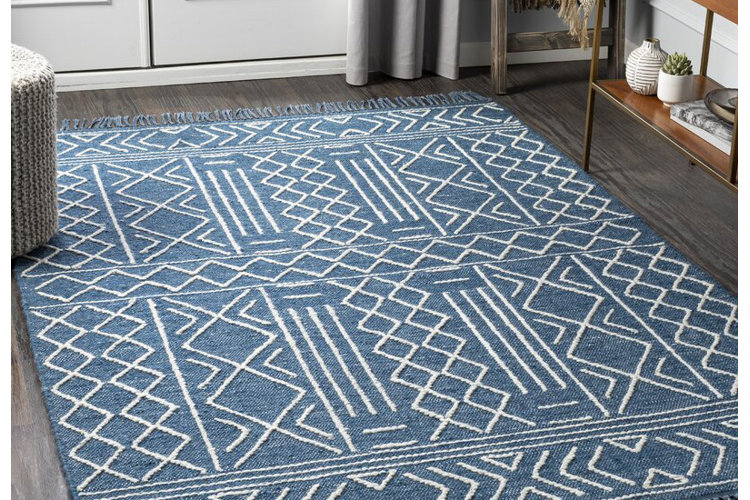 Large patterned entryway rug.
