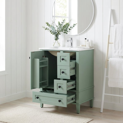 Meuble-lavabo compact avec lavabo en céramique, tiroirs à fermeture en douceur et tablettes de rangement fixées à la porte