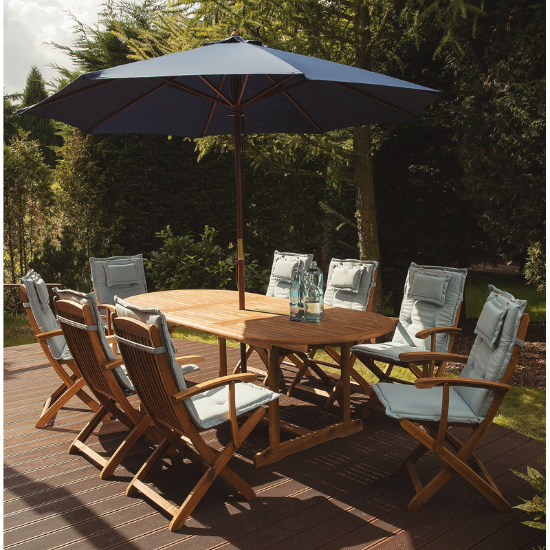 Creel 8 - Person Acacia Wood Patio Dining Set with Extendable Oval Table , Cushions Included, Blue/Navy