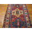 Tapis antique à motif géométrique de style tribal