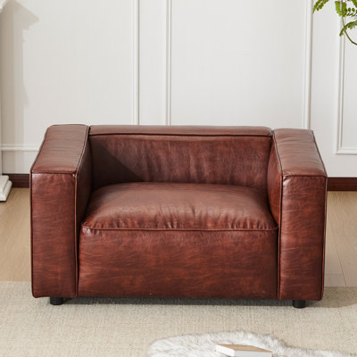 Fauteuil demi-tonneau en similicuir