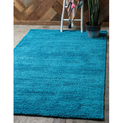 Tapis bleu Carrie