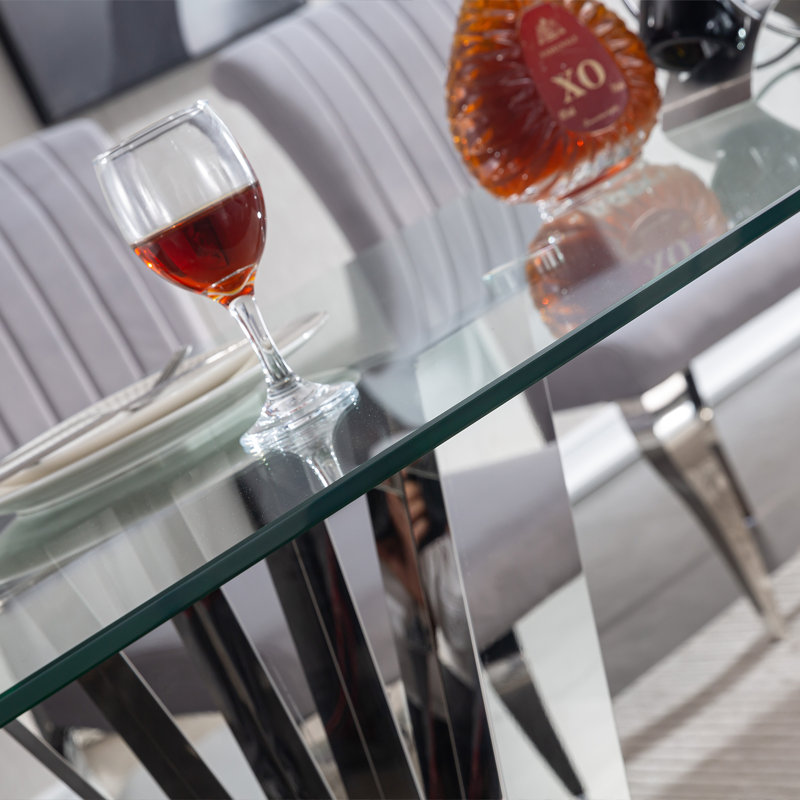 Modern Elegance: table de salle à manger en verre trempé | Miroir argenté avec base en acier inoxydable | Conception élégante et durable