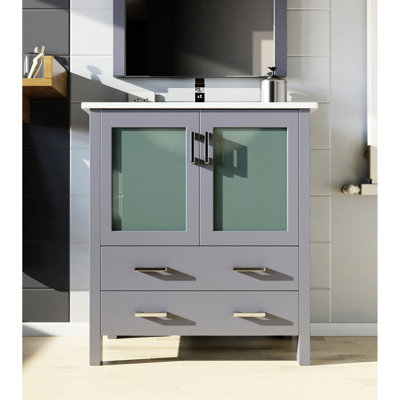 Meuble-lavabo gris foncé de 76 cm de largeur et 46 cm de profondeur, comptoir en céramique blanche, miroir carré de 71 cm, tiroir à fermeture amortie, un placard de rangement pour salle de bain, finition supérieure, fixation murale rectangulaire.