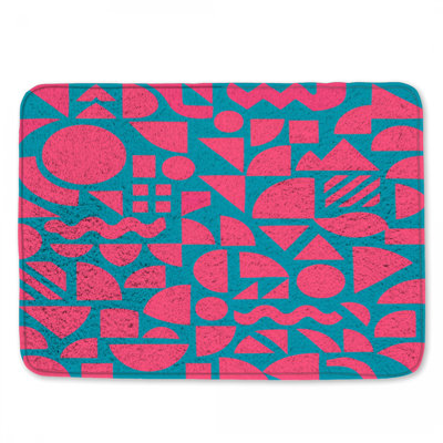 Tapis de bain rose à motif géométrique bleu sarcelle
