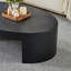 Table basse ovale moderne de luxe avec pieds semi-ronds rainurés en noir