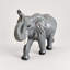 Statue d'éléphant de jardin avec trompe levée