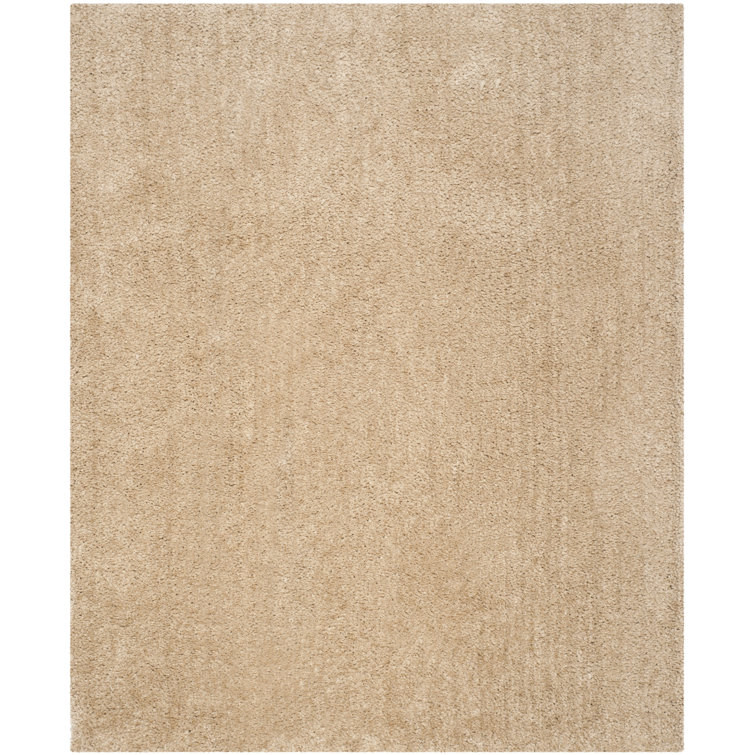 Tapis beige touffeté à la main