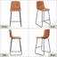 Ensemble de 2 tabourets de bar modernes en cuir de polyuréthane, tabourets de bar à hauteur de comptoir avec dossier, chaises d'îlot de cuisine de style Mid-Century avec structure en métal robuste