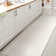 Yaniyah Classic Solid Low-Pile Machine-Washable Cream Rug