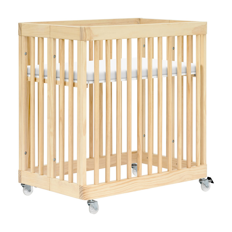 Blonde Pine Wood Convertible Crib with Rounded Spindles
