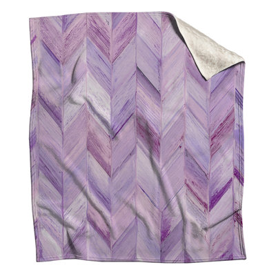 Couvertures mauves à motif de chevrons