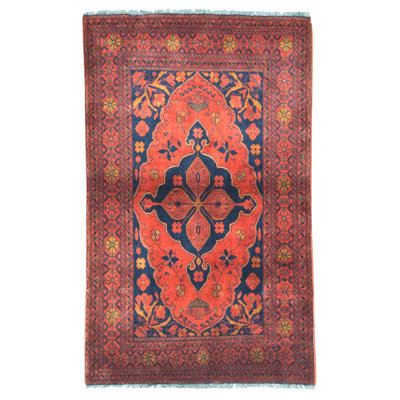 Tapis rectangulaire en laine noué à la main