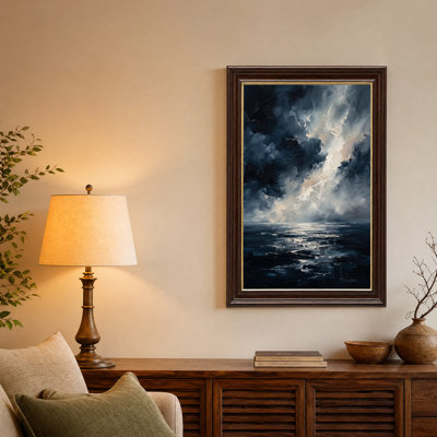 Tableau sur toile représentant un ciel d'orage bleu pictural et l'océan baigné de soleil