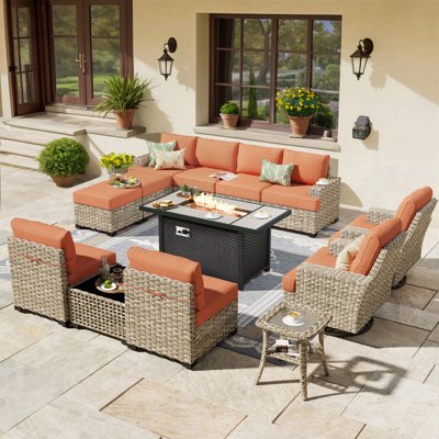 14- Person Rattan Outdoor Seating Group With Swivel Rockers and Fire Pit Table