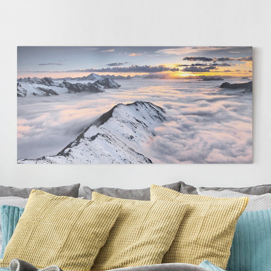 Leinwandbild Blick über Wolken und Berge