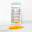 Boîte râpeuse à 4 côtés Tovolo Elements - déchiqueteuse à fromage en acier inoxydable avec côtés à tranche fine grossière, poignée confortable et base stable pour la préparation de la cuisine, grande, brume -116249975