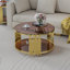 Table basse moderne en verre brun, métal asymétrique, base cylindrique en métal, finition dorée et tablette inférieure