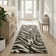 Tapis à motif imprimé animal noir Dondre