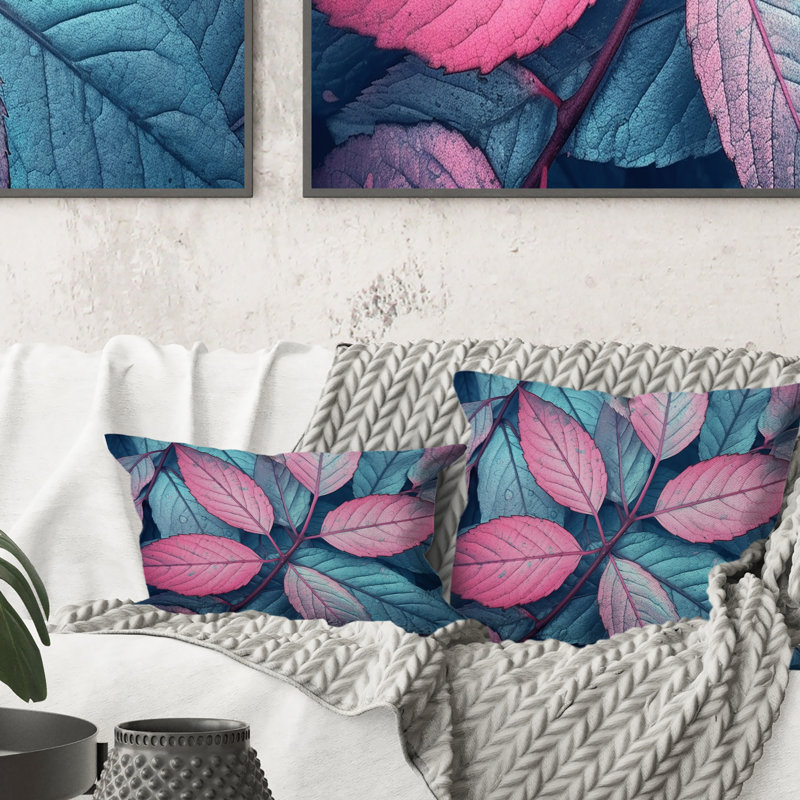 Coussin rose à imprimé floral feuille de splendeur rose