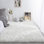 Tapis blanc en imitation peau de mouton à poil long fabriqué à la main Mamduh