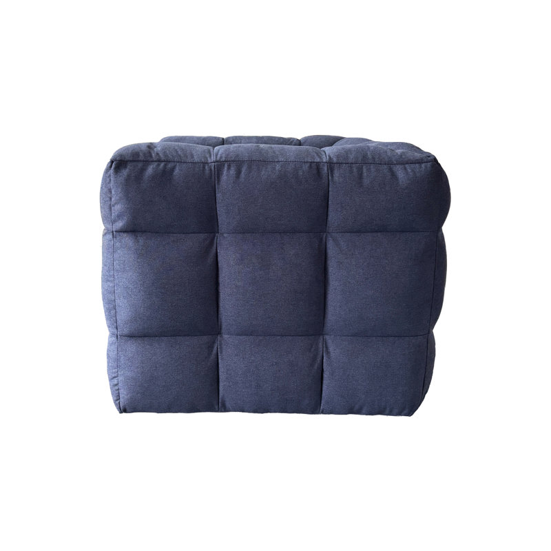 Fauteuil capitonné en tissu avec structure en contreplaqué