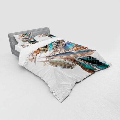 Ensemble de housse de couette à imprimé à ailettes et à plumes et éléments de peau prénatale