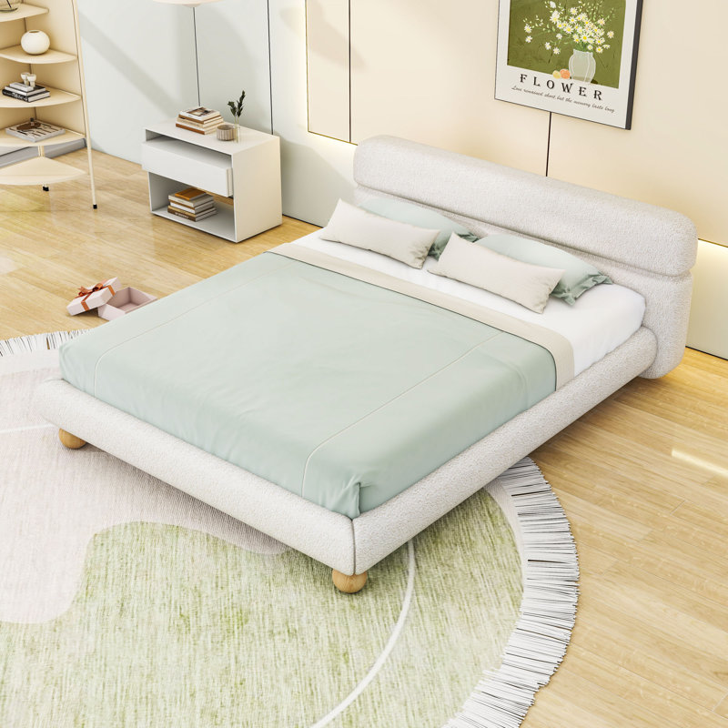 Grand lit plateforme tapissier Teddy, design minimaliste courbé