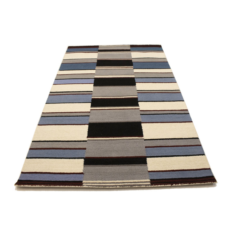 Tapis rayé multicolore en laine touffetée à la main