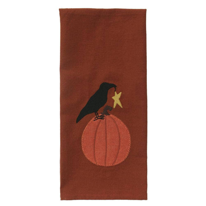 F Corbeau sur une serviette citrouille